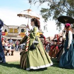Ladies of the court parade through the grounds of the Arizona Renaissance Festival. (James Webb/KTAR)