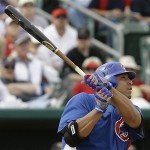 Chicago Cubs pitcher Carlos Zambrano watches his home run during the third inning of a spring training baseball game against the Arizona Diamondbacks on Wednesday, March 5, 2008 in Tucson, Ariz. The Diamondbacks defeated the Cubs 5-4. (AP Photo/M. Spencer Green)