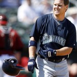 Seattle Mariners' Brad Wilkerson tosses his helmet after striking out during the first inning of a spring training baseball game against the Arizona Diamondbacks on Sunday, March 9, 2008, in Tucson, Ariz. (AP Photo/Nam Y. Huh)