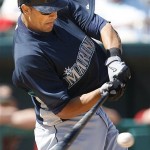 Seattle Mariners' Mike Morse hits a two-run home run during the second inning of a spring training baseball game against the Arizona Diamondbacks on Sunday, March 9, 2008, in Tucson, Ariz. (AP Photo/Nam Y. Huh)