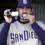 San Diego Padres first baseball Adrian Gonzalez videotapes Wukesong Baseball Field before an exhibition game against the Los Angeles Dodgers, Saturday, March 15, 2008, in Beijing, China. (AP Photo/Robert F. Bukaty)
