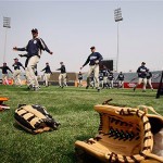 San Diego's Padres baseball team players warms up during a training at Wukesong Baseball Stadium in Beijing, China, Friday, March 14, 2008. The Los Angeles Dodgers will play the San Diego Padres on Saturday and Sunday. Wukesong Baseball Field will be used for the 2008 Beijing Olympics. (AP Photo/Andy Wong)