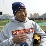 Los Angeles Dodgers pitcher Hong-Chih Kuo, of Taiwan speaks to reporters after a workout, Friday, March 14, 2008, in Beijing, China. The Dodgers will play the San Diego Padres in an exhibition series this weekend. (AP Photo/Robert F. Bukaty)