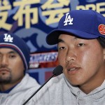Los Angeles Dodgers pitchers Hong-Chih Kuo, of Taiwan, right, and Chan Ho Park, of Korea, speak at a news conference, Friday, March 14, 2008, in Beijing, China. The Dodgers will play the San Diego Padres in an exhibition series this weekend. (AP Photo/Robert F. Bukaty)