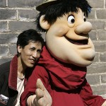A Chinese poses next to Swinging Friar, the San Diego Padres baseball team's mascot, during a visit to the Great Wall, Thursday, March 13, 2008, near Beijing, China. (AP Photo/Robert F. Bukaty)