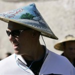 San Diego Padres baseball player Nick Hundley wears a souvenir hat purchased during the team's visit to the Great Wall, Thursday, March 13, 2008, near Beijing, China. (AP Photo/Robert F. Bukaty)