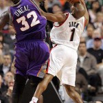 Phoenix Suns Shaquille O'Neal (32) blocks Portland Trail Blazers Jarrett Jack (1) in the fourth quarter of their NBA basketball game Tuesday, March 18, 2008, in Portland, Ore. The Suns defeated the Trail Blazers 111-98. (AP Photo/Rick Bowmer)