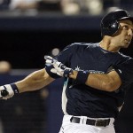 Seattle Mariners' Raul Ibanez follows through on a two-run double against the Arizona Diamondbacks in the first inning during a spring training baseball game in Peoria, Ariz., Wednesday, March 19, 2008. (AP Photo/Chris Carlson)