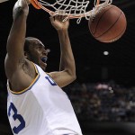 UCLA's Luc Richard Mbah a Moute (23) dunks against Xavier during the second half of their NCAA men's basketball tournament West Regional final, Saturday, March 29, 2008, in Phoenix. UCLA defeated Xavier 76-57. (AP Photo/Mark J. Terrill)