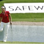 Ai Miyazato, of Japan, adjusts her golf shoe while waiting to putt out on the 18th green during the final round of the LPGA Safeway International golf tournament at Superstition Mountain Golf and Country Club Sunday, March 30, 2008, in Superstition Mountain, Ariz. (AP Photo/Ross D. Franklin)