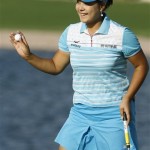 Jee Young Lee, of South Korea, smiles as she waves to the gallery after making a birdie putt on the 18th hole to finish in second place during the final round of the LPGA Safeway International golf tournament at Superstition Mountain Golf and Country Club Sunday, March 30, 2008, in Superstition Mountain, Ariz. (AP Photo/Ross D. Franklin)
