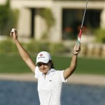 Lorena Ochoa, of Mexico, raises her arms after putting out on the 18th hole for a win in the final round of the LPGA Safeway International golf tournament at Superstition Mountain Golf and Country Club, Sunday, March 30, 2008, in Superstition Mountain, Ariz. Ochoa won the tournament by seven shots, finishing the event at 22-under-par. (AP Photo/Ross D. Franklin)