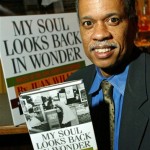  In this photo provided by The Rosen Group, Journalist Juan Williams holds his book "My Soul Looks Back in Wonder," a collection of eyewitness accounts from people who played active roles in the civil rights movement, at the book launch party in this May 26, 2004 file photo in New York. Martin Luther King Jr. was assassinated on April 4, 1968 in Memphis. (AP Photo/The Rosen Group, Stuart Ramson, file)