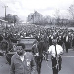  This April 1968 photo released by the MLK Jr. National Historic Site, Martin Luther King Jr.s' body is carried to Morehouse College in Atlanta, on a mule-drawn wagon accompanied by his aides dressed in denim attire. The wagon, mules and denim clothes symbolized the Poor People's Campaign. The photograph is part of the exhibition "From Memphis to Atlanta: The Drum Major Returns Home" at Atlanta's Martin Luther King, Jr. National Historic Site April 4-August 31, 2008. (AP Photo/MLK Jr. National Historic Site,Courtesy of Bob Adelman)

