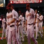 Members from the Arizona Diamondbacks walk off the field after greeting fans in their home opener against the Los Angeles Dodgers on Monday at Chase Field. Samantha Hjelle For Sports 620 KTAR