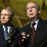  Sen. Mitch McConnell, R- Ky., right, and Sen. Harry Reid, D-Nev., are shown in this 2004 file photo in Washington. Senate leaders announced an agreement Wednesday on legislation to ease the slumping housing market and help millions of families threatened by foreclosure. (AP Photo/Evan Vucci, FILE)