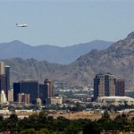  Downtown Phoenix is backdropped by what was formerly called Squaw Peak, rear right, in this April 16, 2003 file photo. The U.S. Board on Geographic Names voted Thursday April 10, 2008 to officially change the name of the prominent Phoenix mountain to Piestewa Peak to honor Army Spc. Lori Piestewa, the first American Indian woman to die in combat while serving in the U.S. military in Iraq, 2003. (AP Photo/Matt York,File)