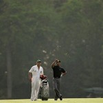 Tiger Woods, right, accompanied by his caddie Steve Williams checks the wind on the 12th fairway during the second round of the 2008 Masters golf tournament at the Augusta National Golf Club in Augusta, Ga., Friday.