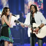 Miley Cyrus and her father, Billy Ray Cyrus, sing a duet "Ready, Set, Don't Go", during the CMT Music Awards, Monday, April 14, 2008, in Nashville, Tenn.. (AP Photo/Jeff Christensen)
