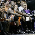 Phoenix Suns center Shaquille O'Neal, center, sits on the bench with foul trouble during their first quarter against the San Antonio Spurs in Game 1 of an NBA basketball playoff first-round series in San Antonio, Saturday, April 19, 2008. (AP Photo/Eric Gay)