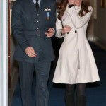  In this Friday April 11, 2008. file photo, Britain's Prince William and his girlfriend Kate Middleton walk in RAF Cranwell, England after William received his RAF wings from his father the Prince of Wales. (AP Photo/Michael Dunlea, Pool)
