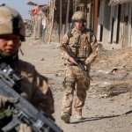  In this photo made available Sunday March 2, 2008, Britain's Prince Harry, right, on patrol through the deserted town of Garmisir Jan. 2, 2008, close to FOB (forward operating base) Delhi, where he was posted in Helmand province Southern Afghanistan. (AP Photo/John Stillwell, pool)