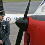 Britain's Prince William, watches a RAF plane, which his father was trained to fly in 1969, after he graduated from the Royal Air Force College at the RAF Cranwell, in Cranwell, northern England, Friday April 11, 2008. Prince William was presented with his ceremonial pilot's wings Friday by his father Prince Charles, as he graduated as a military pilot and followed in the footsteps of a host of his royal ancestors. (AP Photo/Lefteris Pitarakis)
