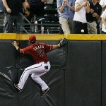 Arizona Diamondbacks' Jeff Salazar is unable to catch a fly ball hit by Houston Astros' J.R. Towles for a double in the third inning of a baseball game Tuesday, April 29, 2008, in Phoenix. (AP Photo/Ross D. Franklin)