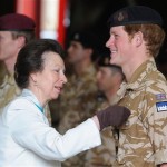 Britain's Princess Anne, left, presents Prince Harry with his campaign medal, in Windsor, England, Monday May 5, 2008. The 23-year-old Prince, known as Lieutenant Wales, is among around 160 members of the Household Cavalry who served in Afghanistan this winter to receive the decoration. (AP Photo/John Stillwell, pool)