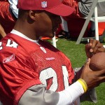 Cardinals safety Adrian Wilson signs an autograph for a fan during the Arizona Cardinals Fan Fest on Saturday, May 3 at the Cardinals training facility in Tempe.

(Courtesy of Jay Chapman/Sports 620 KTAR)