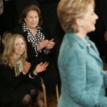 Daughter Chelsea Clinton, left, and mother Dorothy Rodham, center, applaud Democratic presidential hopeful Sen. Hillary Rodham Clinton, D-N.Y., as she speaks after her Pennsylvania Primary win over Sen. Barack Obama, D-Ill., in Philadelphia, Tuesday, April 22, 2008. (AP Photo/Charles Rex Arbogast)