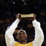 Los Angeles Lakers' Kobe Bryant holds the NBA's Most Valuable Player trophy before Game 2 with the Utah Jazz in an NBA Western Conference semifinal playoff basketball series at the Staples Center in Los Angeles, Wednesday, May 7, 2008. (AP Photo/Kevork Djansezian)