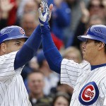 Chicago Cubs' Kosuke Fukudome, of Japan, right, celebrates with Aramis Ramirez after hitting a two-run home run against the Arizona Diamondbacks during the seventh inning of a baseball game on Saturday, May 10, 2008 in Chicago. (AP Photo/Nam Y. Huh)

