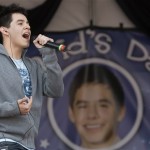 American Idol contestant David Archuleta waves to fans at his high school Friday, May 9, 2008, in Murray, Utah. (AP Photo/Kenny Crookston)