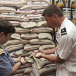 n this picture released by ECPA-D Wednesday, May 14, 2008, rice is checked by unidentified French officers in a retailer shop in Chennai, India, Tuesday, May 13, 2008, before being loaded with humanitarian aid to Myanmar. France has sent the vessel, Le Mistral, with 1,500 tons of emergency relief materials to the nation's cyclone victims. (AP Photo/Sgt Richard Nicolas Nelson, ECPA-D French Defense Ministry)