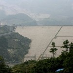 A view of the Zipingpu Dam where Chinese soldiers had earlier rushed to shore up cracks after Monday's earthquake near Dujiangyan, southwestern China's Sichuan province, Thursday, May 15, 2008. China warned the death toll from this week's earthquake could soar to 50,000, while the government issued a rare public appeal Thursday for rescue equipment as it struggled to cope with the disaster. (AP Photo/Ng Han Guan)
