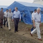 n this photo released by Myanma News Agency, John Holmes, the U.N. undersecretary-general for humanitarian affairs, right, walks with other officials as he visits the area that was hit by Cyclone Nargis in Myanmar Monday, May 19, 2008. Myanmar's junta on Monday announced a three-day mourning period for victims of the cyclone that left at least 130,000 people dead or missing, while the country's neighbors made plans to help distribute foreign aid to survivors. (AP Photo/Myanma News Agency, HO)