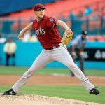 Arizona Diamondbacks' Micah Owings pitches against the Florida Marlins in the third inning of a baseball game in Miami, Tuesday, May 20, 2008. (AP Photo/Alan Diaz)