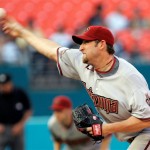 Arizona Diamondbacks' Brandon Webb pitches against the Florida Marlins in the first inning of a baseball game in Miami, Wednesday, May 21, 2008. (AP Photo/Alan Diaz)