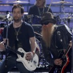 David Cook performs the song "Sharp Dressed Man" with ZZ Top's Billy Gibbons during the season finale of American Idol on Wednesday May 21, 2008, in Los Angeles. (Mark Mainz/AP Images for Fox)