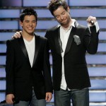 David Archuleta, left, and David Cook, wait to hear Ryan Seacrest announce the winner of American Idol during the season finale on Wednesday May 21, 2008, in Los Angeles. (Mark Mainz/AP Images for Fox)
