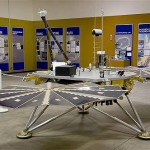 A full scale model of the Phoenix Mars Lander is displayed in the University of Arizona's Science Operations Center just north of the campus in Tucson, Ariz., Wednesday, May 7, 2008. If the lander makes a successful touchdown in Mars' northern polar region, NASA's Jet Propulsion Laboratory in California will turn over scientific control to researchers at the university's Lunar and Planetary Laboratory. (. (AP Photo/John Miller)