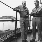  This Sept. 2, 1945 black-and-white file photo provided by the McCain Presidential Campaign shows Republican presidential candidate, Sen. John McCain's father and grandfather on the bridge of the submarine tender USS Proteus, in Tokyo Bay a few hours after WWII had ended. It was the last time father and son saw each other. The son was 34 and a submarine commander. His crew had just brought a surrendered Japanese sub into the bar. His father had just relinquished command of a carrier task force and had attended the signing of the Japanese surrender aboard the USS Missouri that morning. He died of a heart attack several days later. (AP Photo/McCain Presidential Campaign)
