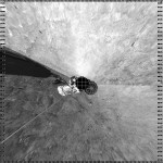 The Surface Stereo Imager Right on NASA's Phoenix Mars Lander acquired the individual images that are combined into this one view, provided by NASA, Thursday, May 29, 2008. The spacecraft successfully freed its 8-foot robotic arm from the restraints that kept it folded up and protected from vibrations during the launch and landing, scientists said Thursday. Preparations are now under way to partially flex the arm. (AP Photo/NASA/JPL-Caltech/University of Arizona)
