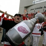 Detroit Red Wings fans cheer outside the Joe Louis Arena in Detroit, Monday, June 2, 2008 before the Pittsburgh Penguins play the Red Wings in Game 5 of the Stanley Cup hockey finals. (AP Photo/Gene Puskar)