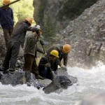 Chinese workers drill rocks to widen Pitiao River which is blocked by fallen rocks in the landslide triggered by the May 12 earthquake near Wolong, China's southwest Sichuan province, Tuesday, June 10, 2008. (AP Photo/Alexander F. Yuan)
