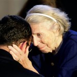 Margaret McKay, the wife of Jim McKay, comforts her grandson James Fontelieu during a memorial service for the veteran sportscaster, Tuesday, June 10, 2008, at the Cathedral of Mary Our Queen in Baltimore. McKay died Saturday at age 87. (AP Photo/Rob Carr, Pool)