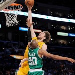 Los Angeles Lakers forward Pau Gasol (16), of Spain, shoots over Boston Celtics guard Ray Allen (20) in the first half of Game 4 of the NBA basketball finals Thursday.