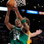 Boston Celtics forward Paul Pierce (34) shoots as Los Angeles Lakers forward Pau Gasol (16), of Spain, defends in the second half of Game 4 of the NBA basketball finals Thursday.