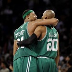 Boston Celtics' Paul Pierce, left, and Ray Allen celebrate their team's 97-91 victory over the Los Angeles Lakers in Game 4 of the NBA basketball finals Thursday.